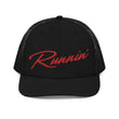 Load image into Gallery viewer, Front profile of black snapback UNLV Runnin' Rebel basketball trucker hat with vintage style Runnin' in red script