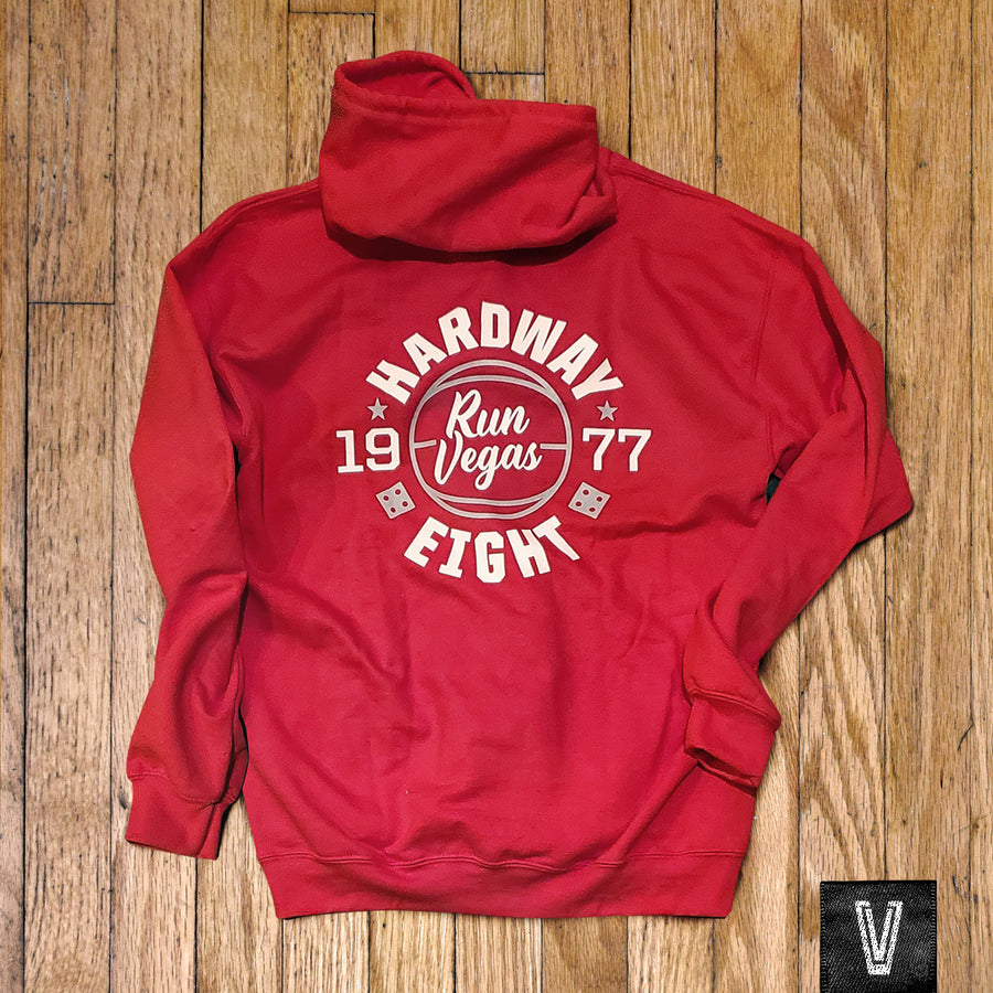 Back side of red vintage UNLV basketball zip up cotton hoodie with 1977 Hardway Eight circled around the words "RUN VEGAS"